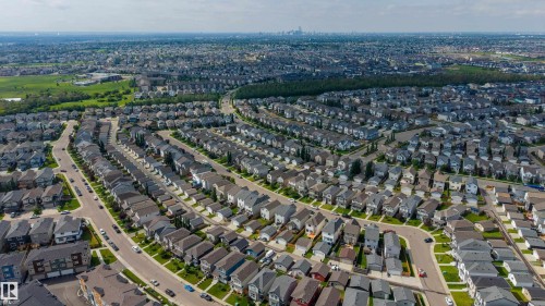 Extensive residential development featuring numerous single-family homes with varied architectural styles and rooflines - 17707 59 Street Nw, Edmonton, AB - Outdoor With View
