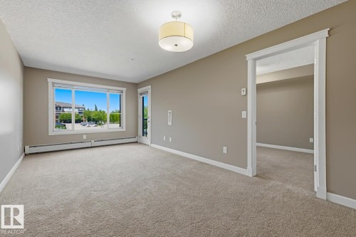 #202 3715 Whitelaw Ln Nw, Edmonton, AB - Indoor Photo Showing Other Room
