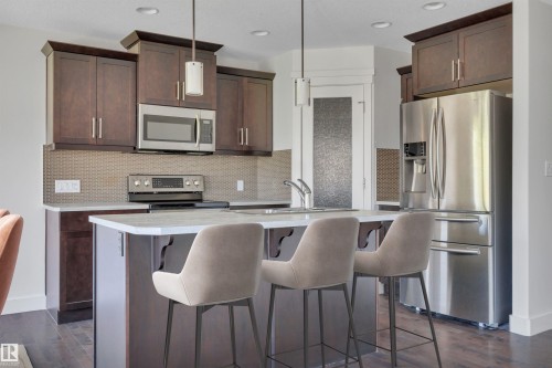 59 Davis Street, Fort Saskatchewan, AB - Indoor Photo Showing Kitchen With Stainless Steel Kitchen With Upgraded Kitchen