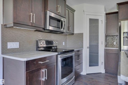 59 Davis Street, Fort Saskatchewan, AB - Indoor Photo Showing Kitchen With Stainless Steel Kitchen With Upgraded Kitchen