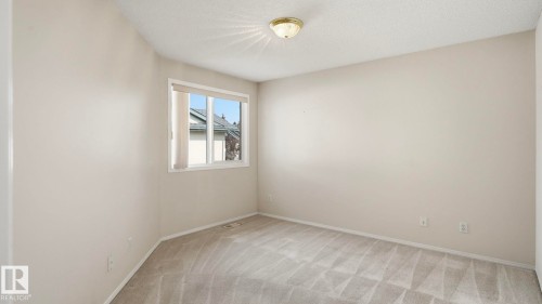 #31 8 Dechene Rd Nw, Edmonton, AB - Indoor Photo Showing Other Room