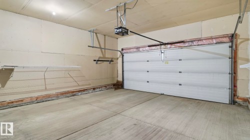 #31 8 Dechene Rd Nw, Edmonton, AB - Indoor Photo Showing Garage