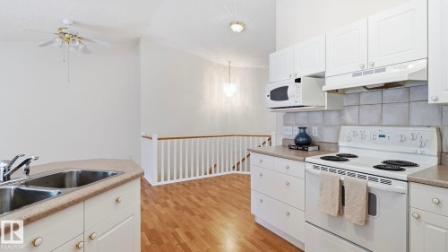 #31 8 Dechene Rd Nw, Edmonton, AB - Indoor Photo Showing Kitchen With Double Sink