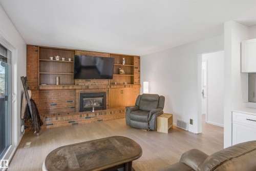 318 Grand Meadow Crescent Nw, Edmonton, AB - Indoor Photo Showing Living Room With Fireplace