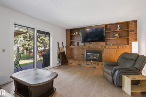318 Grand Meadow Crescent Nw, Edmonton, AB - Indoor Photo Showing Living Room With Fireplace