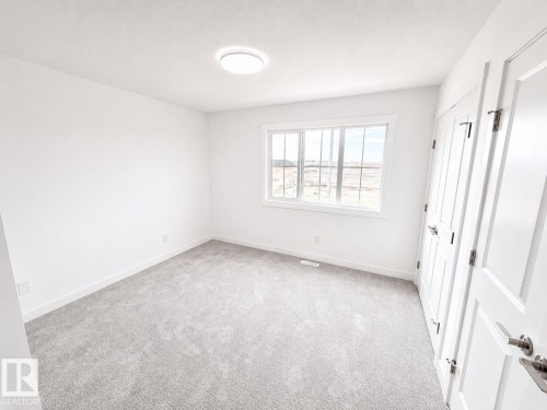 #38 7110 Keswick Cm Sw, Edmonton, AB - Indoor Photo Showing Other Room
