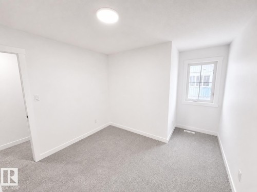 #38 7110 Keswick Cm Sw, Edmonton, AB - Indoor Photo Showing Other Room