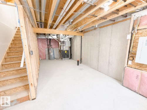#38 7110 Keswick Cm Sw, Edmonton, AB - Indoor Photo Showing Basement