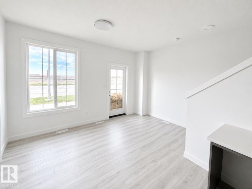 #38 7110 Keswick Cm Sw, Edmonton, AB - Indoor Photo Showing Other Room
