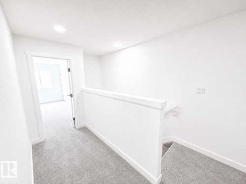 #38 7110 Keswick Cm Sw, Edmonton, AB - Indoor Photo Showing Other Room