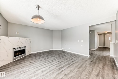 784 Blackburn Place Sw, Edmonton, AB - Indoor With Fireplace