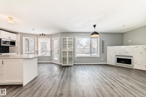 784 Blackburn Place Sw, Edmonton, AB - Indoor With Fireplace