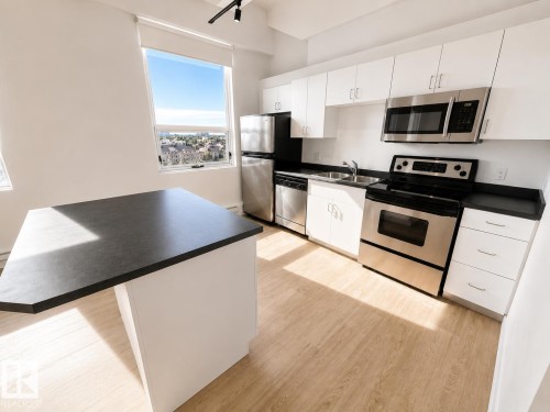 #702 10105 109 St Nw, Edmonton, AB - Indoor Photo Showing Kitchen With Stainless Steel Kitchen With Double Sink