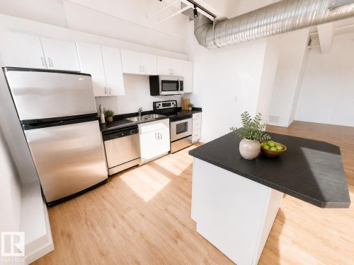 #702 10105 109 St Nw, Edmonton, AB - Indoor Photo Showing Kitchen With Stainless Steel Kitchen