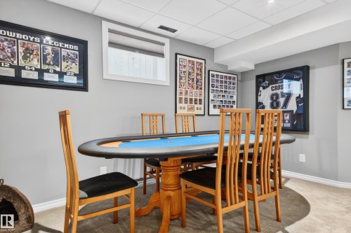 Recreational room featuring carpet flooring, recessed lighting, a drop ceiling, and neutral wall paint - 9 Snowbird Crescent, Leduc, AB - Indoor Photo Showing Dining Room