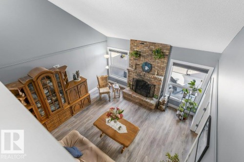 7 Whiteoaks Estates, St. Albert, AB - Indoor Photo Showing Living Room With Fireplace