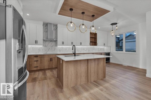 1115 Gyrfalcon Crescent Nw, Edmonton, AB - Indoor Photo Showing Kitchen With Upgraded Kitchen