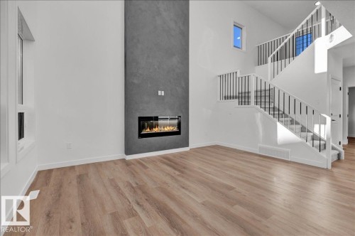 1115 Gyrfalcon Crescent Nw, Edmonton, AB - Indoor With Fireplace