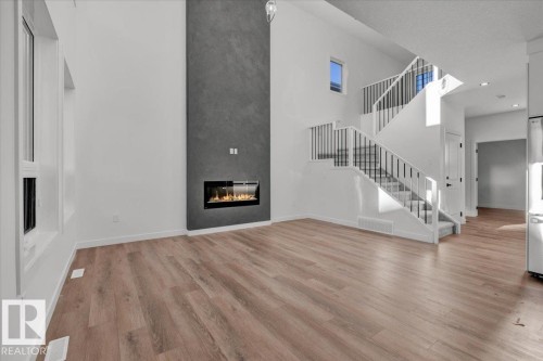 1115 Gyrfalcon Crescent Nw, Edmonton, AB - Indoor With Fireplace