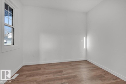 1115 Gyrfalcon Crescent Nw, Edmonton, AB - Indoor Photo Showing Other Room