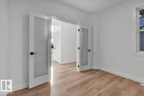 1115 Gyrfalcon Crescent Nw, Edmonton, AB - Indoor Photo Showing Other Room