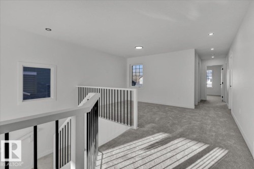 1115 Gyrfalcon Crescent Nw, Edmonton, AB - Indoor Photo Showing Other Room