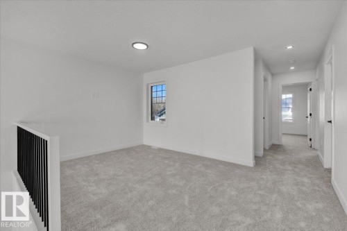 1115 Gyrfalcon Crescent Nw, Edmonton, AB - Indoor Photo Showing Other Room