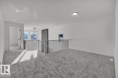1115 Gyrfalcon Crescent Nw, Edmonton, AB - Indoor Photo Showing Other Room