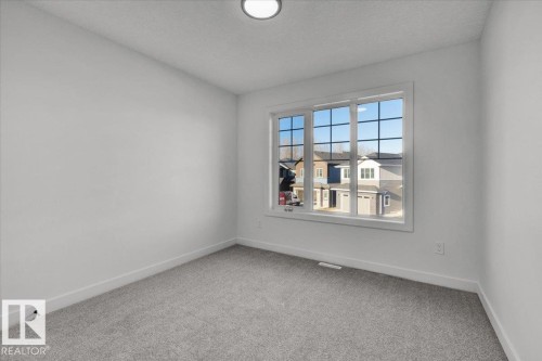 1115 Gyrfalcon Crescent Nw, Edmonton, AB - Indoor Photo Showing Other Room