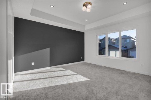 1115 Gyrfalcon Crescent Nw, Edmonton, AB - Indoor Photo Showing Other Room