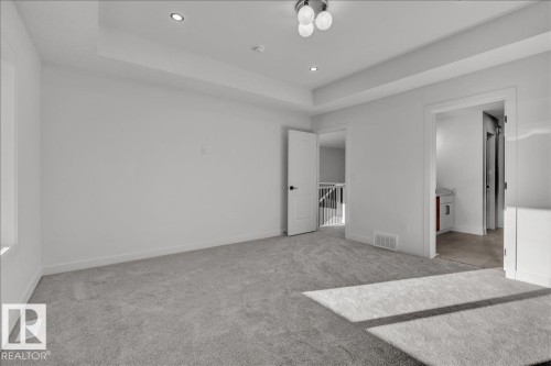 1115 Gyrfalcon Crescent Nw, Edmonton, AB - Indoor Photo Showing Other Room