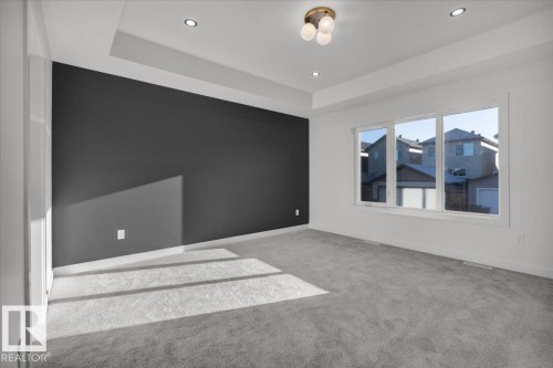 1115 Gyrfalcon Crescent Nw, Edmonton, AB - Indoor Photo Showing Other Room