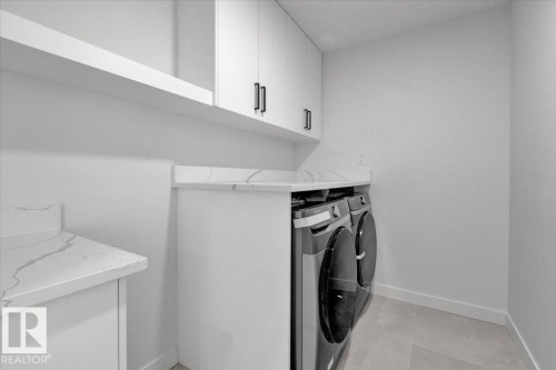 1115 Gyrfalcon Crescent Nw, Edmonton, AB - Indoor Photo Showing Laundry Room