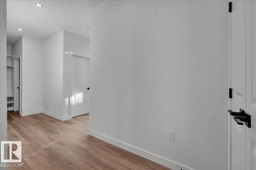 1115 Gyrfalcon Crescent Nw, Edmonton, AB - Indoor Photo Showing Other Room