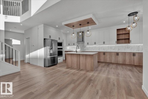1115 Gyrfalcon Crescent Nw, Edmonton, AB - Indoor Photo Showing Kitchen With Upgraded Kitchen