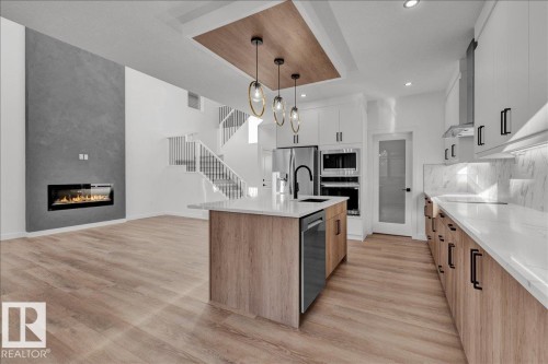 1115 Gyrfalcon Crescent Nw, Edmonton, AB - Indoor Photo Showing Kitchen With Upgraded Kitchen