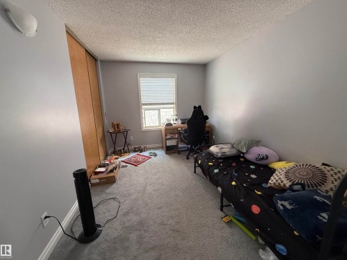 8025 15A Avenue Nw, Edmonton, AB - Indoor Photo Showing Bedroom