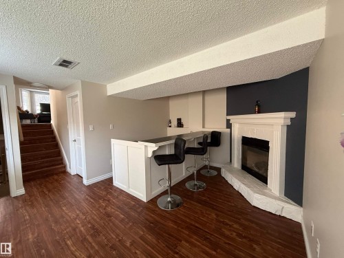 8025 15A Avenue Nw, Edmonton, AB - Indoor With Fireplace