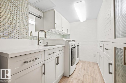 #202 10010 119 St Nw, Edmonton, AB - Indoor Photo Showing Laundry Room