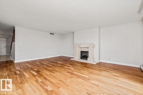 #202 10010 119 St Nw, Edmonton, AB - Indoor With Fireplace