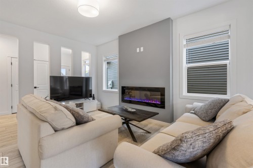 30 Riverhill Crescent, St. Albert, AB - Indoor Photo Showing Living Room With Fireplace