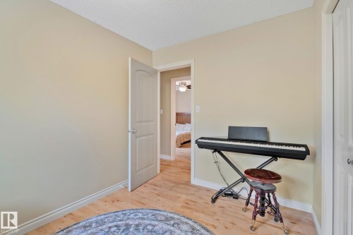 Wood-finish flooring throughout - 7306 21 Avenue Nw, Edmonton, AB - Indoor
