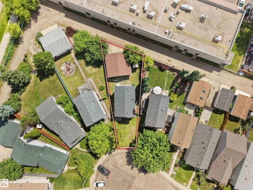 Aerial perspective showcasing the property's irregular lot shape and surrounding neighborhood - 3509 43A Avenue Nw, Edmonton, AB - Outdoor With View