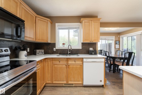 5108 63 Street, Beaumont, AB - Indoor Photo Showing Kitchen With Double Sink