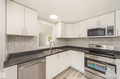 1913 West Royal Way Northwest, Edmonton, AB - Indoor Photo Showing Kitchen With Double Sink With Upgraded Kitchen