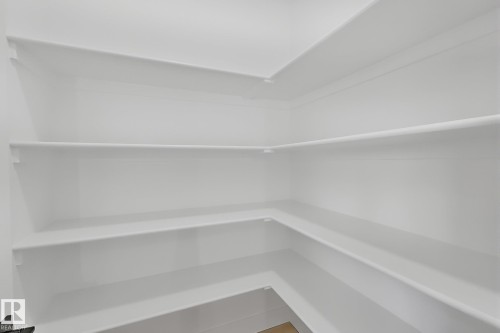 Built-in shelving providing extensive storage - 4215 63 Street, Beaumont, AB - Indoor With Storage