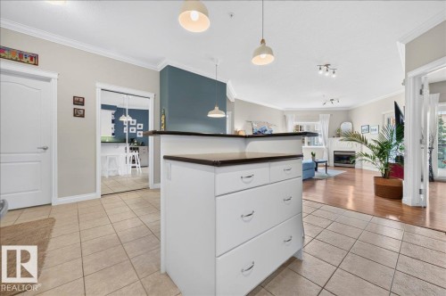#306 10116 80 Av Nw, Edmonton, AB - Indoor With Fireplace