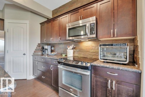 #10 15151 43 St Nw, Edmonton, AB - Indoor Photo Showing Kitchen