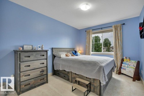 Spacious 2nd bedroom - East facing window - #10 15151 43 St Nw, Edmonton, AB - Indoor Photo Showing Bedroom