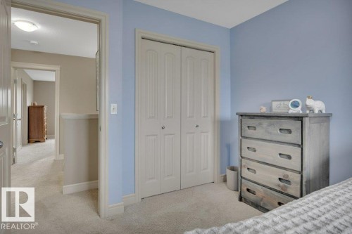 2nd bedroom - large closet space - #10 15151 43 St Nw, Edmonton, AB - Indoor Photo Showing Bedroom